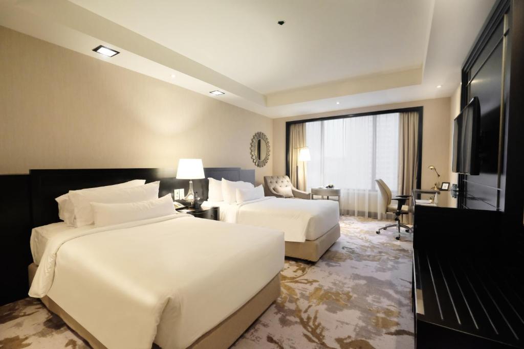 Двухместный (Двухместный номер «Премьер» с 1 кроватью или 2 отдельными кроватями) отеля AYANA Midplaza JAKARTA, Джакарта