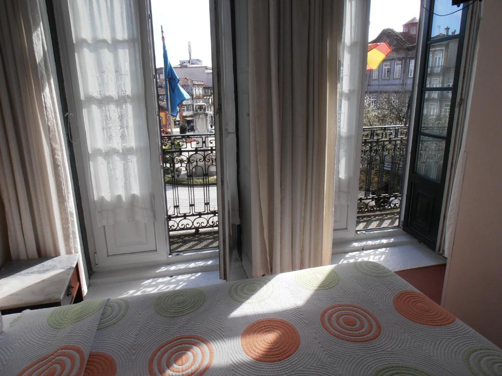 Двухместный (Двухместный номер с 2 отдельными кроватями и видом на город) отеля Hotel S. Marino, Порту