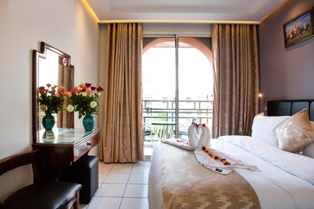 Двухместный (Двухместный номер с 1 кроватью или 2 отдельными кроватями) отеля Hotel Akabar, Марракеш