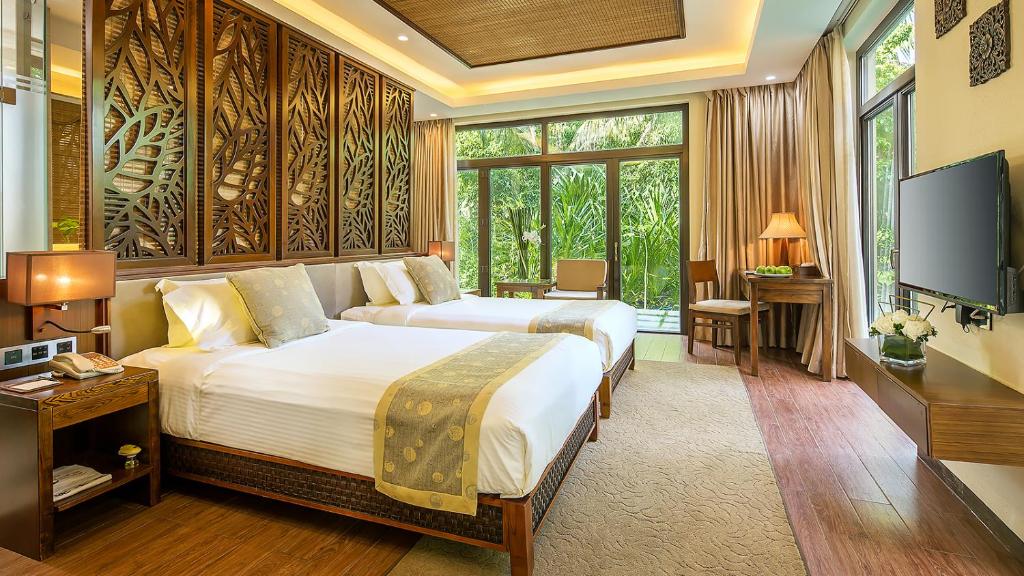 Двухместный (Ограниченное предложение - Двухместный номер Делюкс с 2 отдельными кроватями) отеля Yalong Bay Villas & Spa, Санья