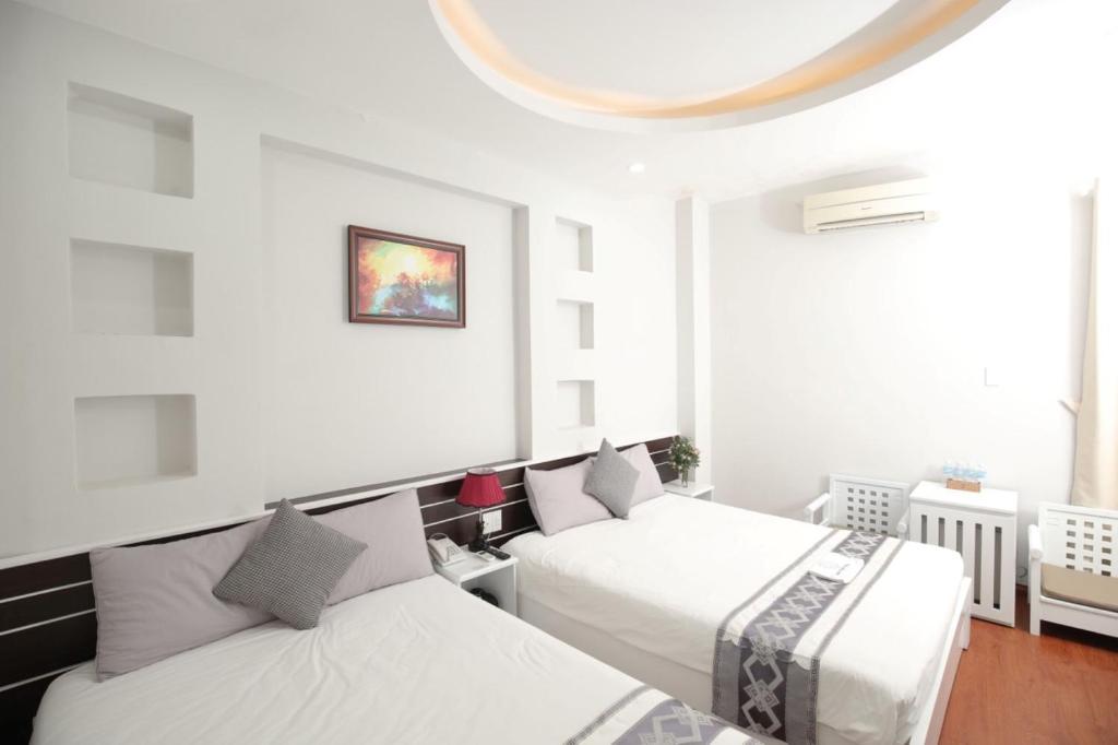 Двухместный (Улучшенный двухместный номер с 2 отдельными кроватями и видом на город) отеля Nha Trang Pearl Hotel, Нячанг