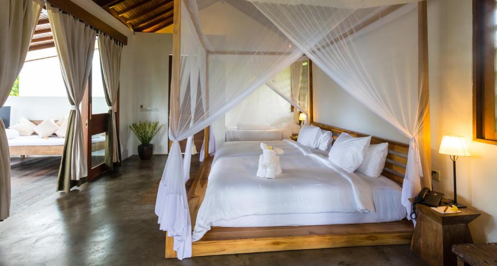 Вилла (Вилла с 3 спальнями, собственным бассейном и гидромассажной ванной), De Ubud Villas & Spa