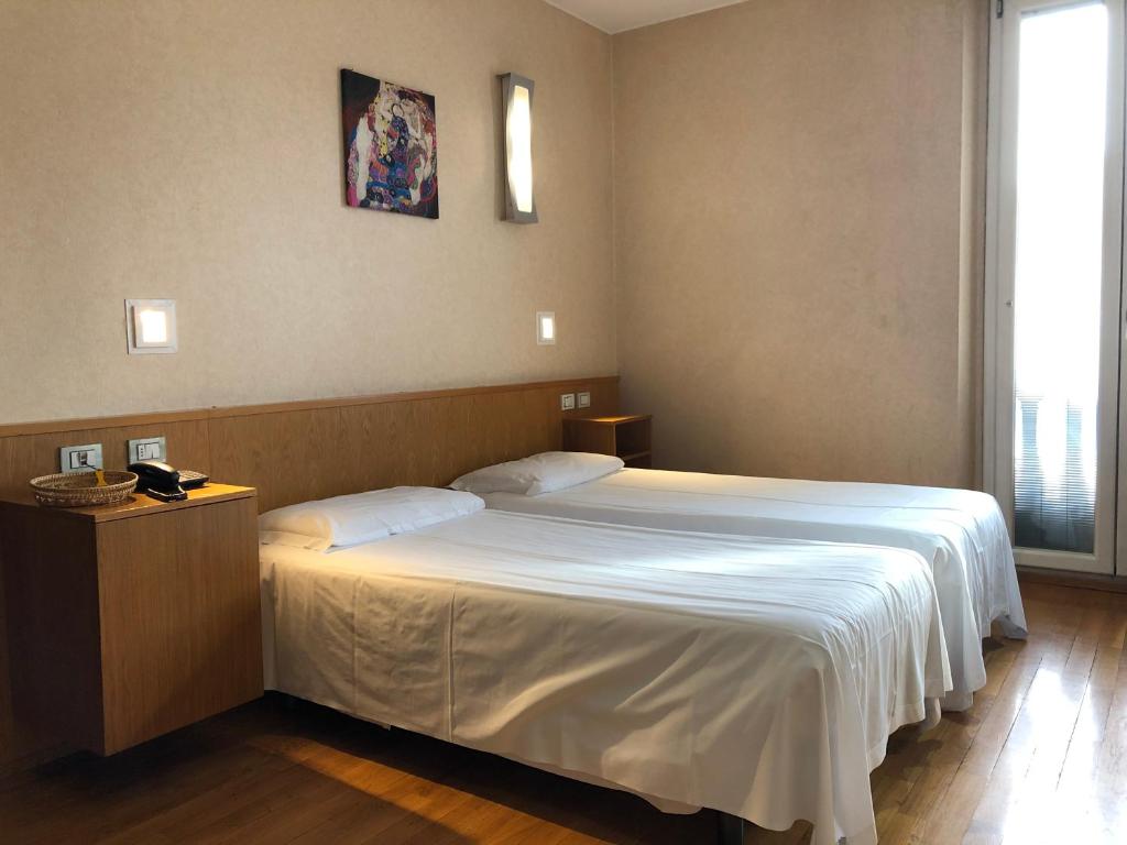 Двухместный (Улучшенный двухместный номер с 1 кроватью или 2 отдельными кроватями) отеля Eurohotel, Милан