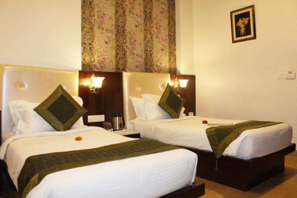 Двухместный (Двухместный номер Делюкс с 1 кроватью или 2 отдельными кроватями) отеля Hotel Apple Inn, Джайпур