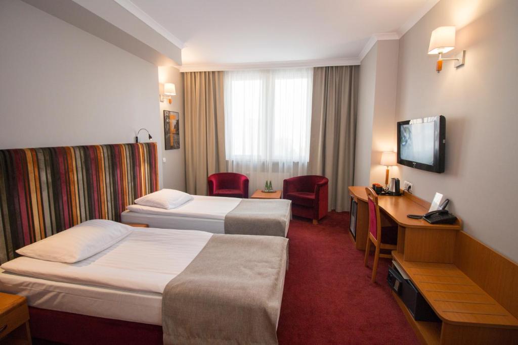 Двухместный (Стандартный двухместный номер с 2 отдельными кроватями) отеля Hotel Filmar, Торунь