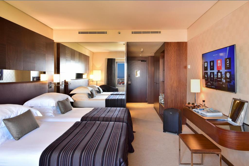 Двухместный (Представительский двухместный номер с 2 отдельными кроватями) отеля Porto Palacio Congress Hotel & Spa, Порту