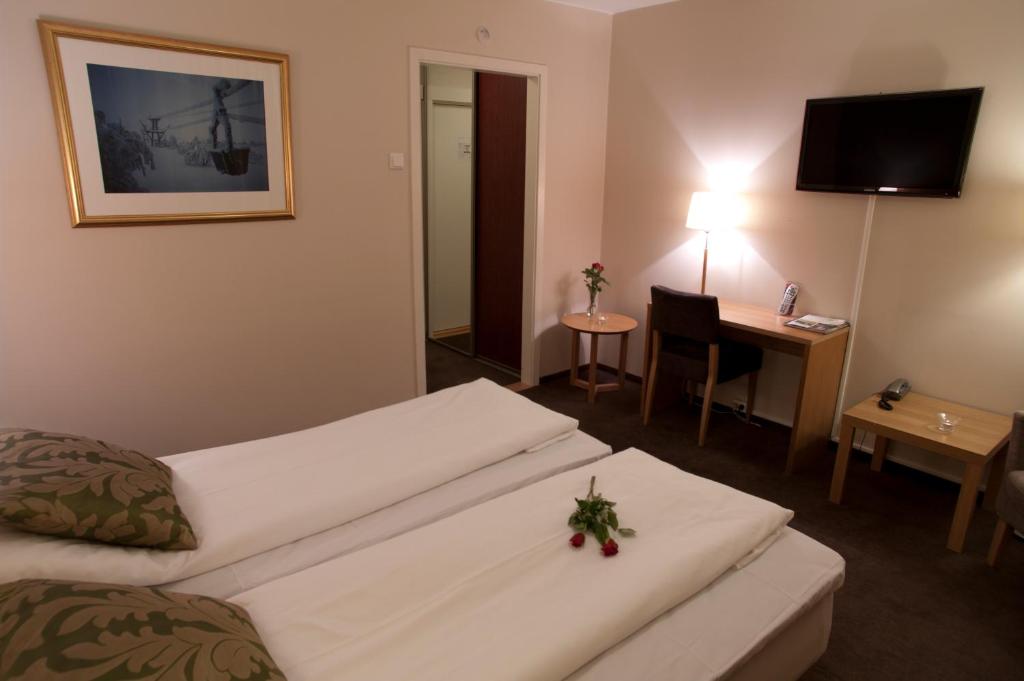 Двухместный (Улучшенный двухместный номер с 2 отдельными кроватями) отеля Bergstadens Hotel, Тронхейм