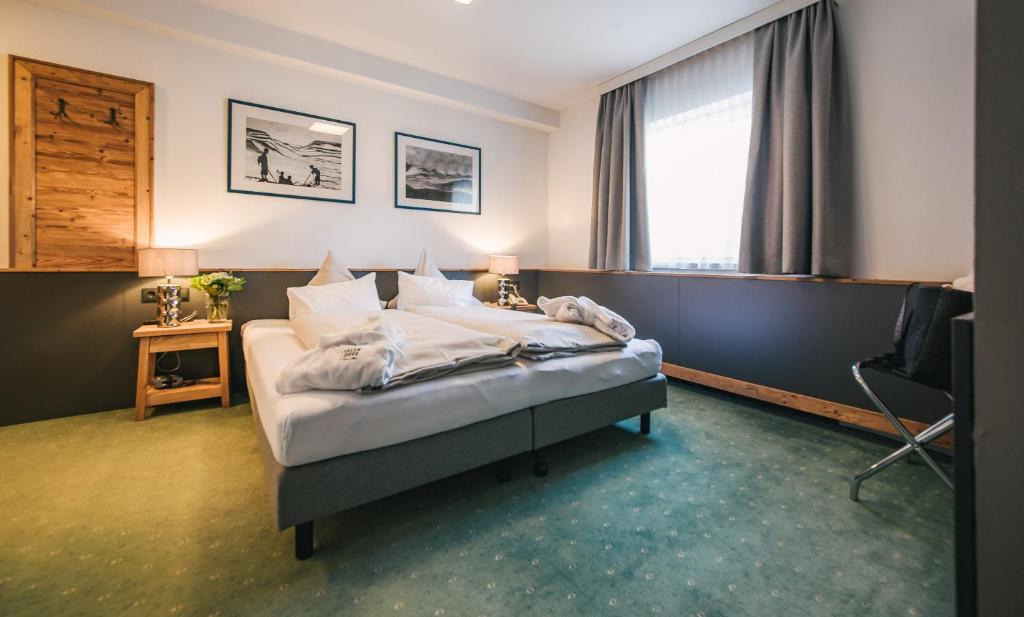 Двухместный (Двухместный номер с 1 кроватью или 2 отдельными кроватями) отеля Hotel Arlenburg, Санкт-Антон-ам-Арльберг