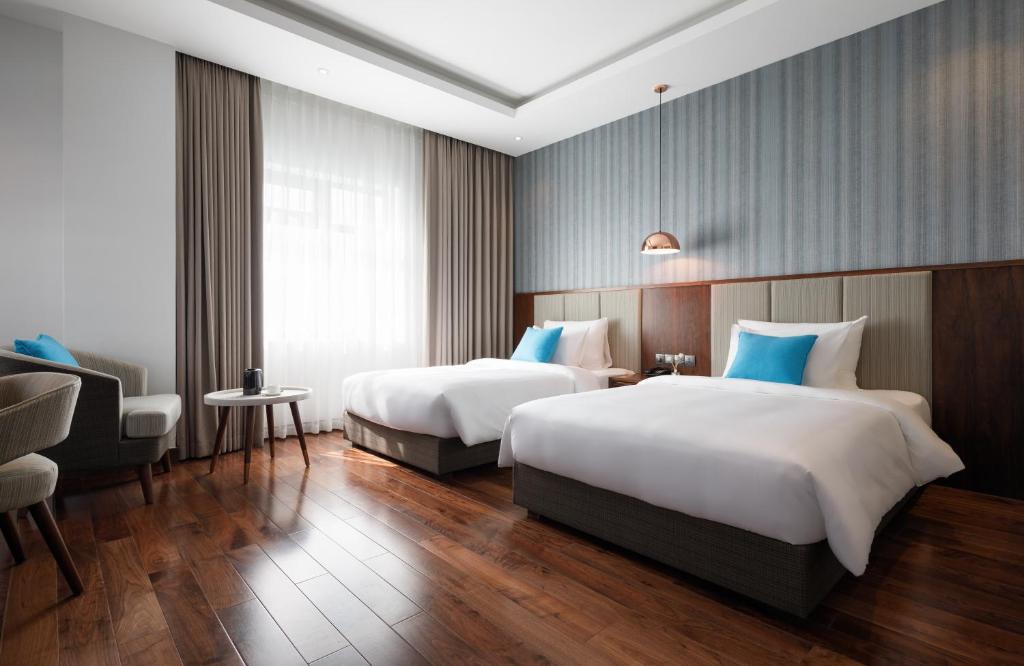 Двухместный (Двухместный номер Делюкс с 2 отдельными кроватями) отеля D'Lecia Ha Long Hotel, Халонг