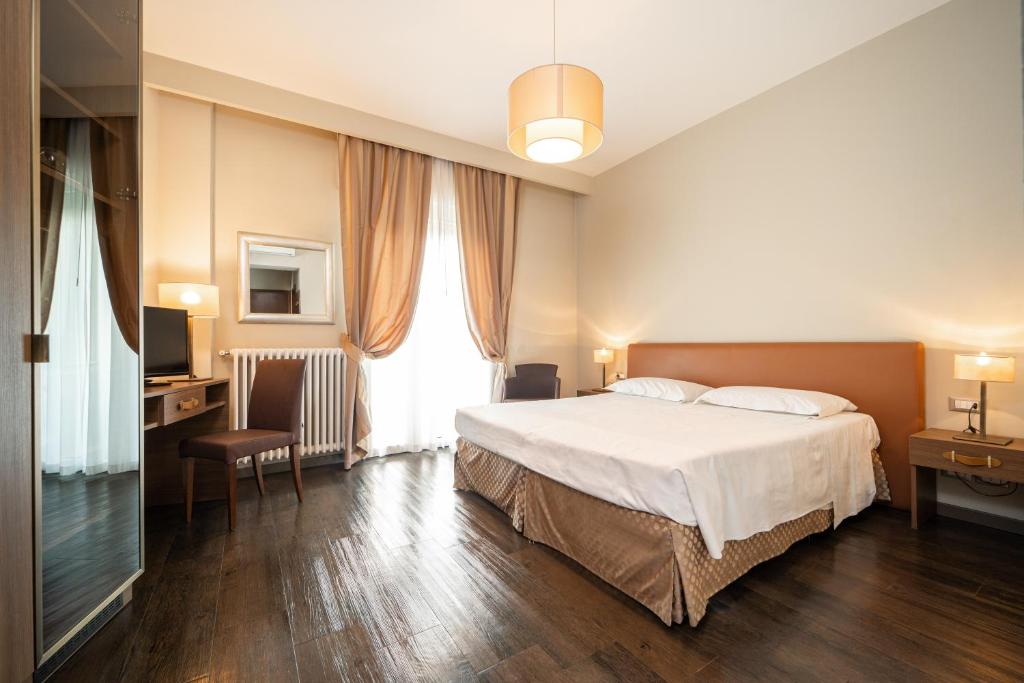 Двухместный (Двухместный номер Делюкс с 1 кроватью) отеля Hotel Ariston Molino Terme, Абано-Терме