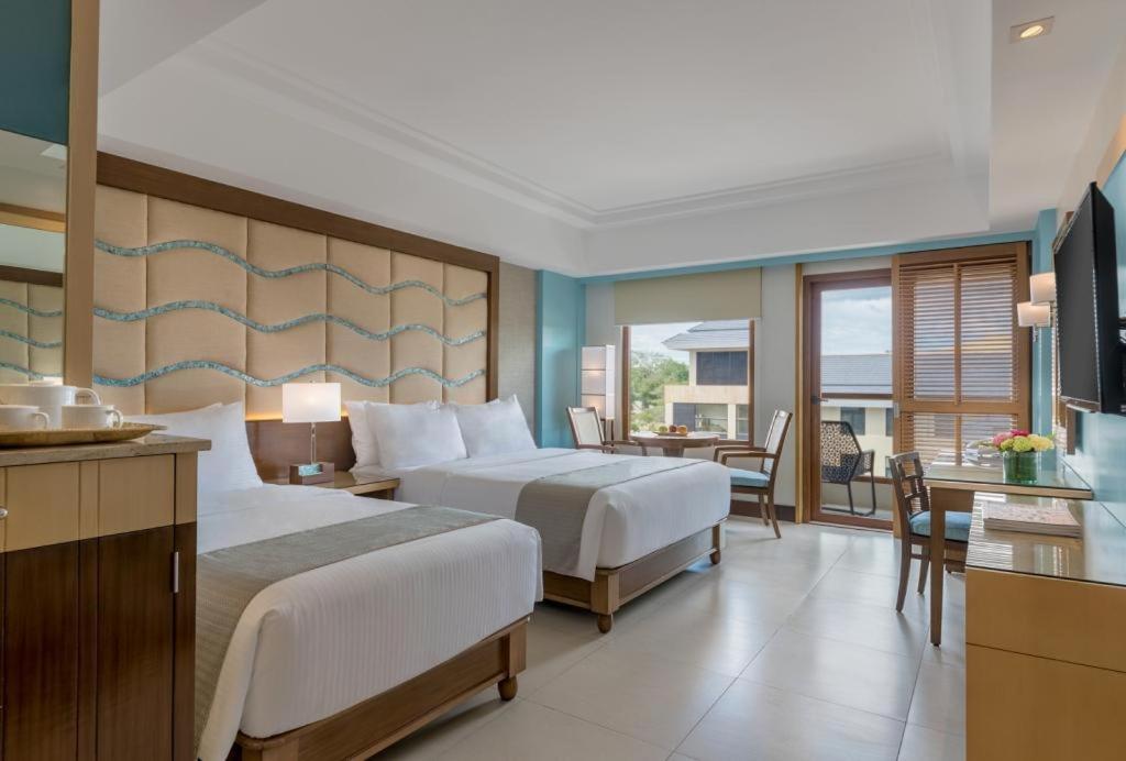 Двухместный (Улучшенный двухместный номер с 1 кроватью или 2 отдельными кроватями) курортного отеля Henann Resort Alona Beach, Панглао