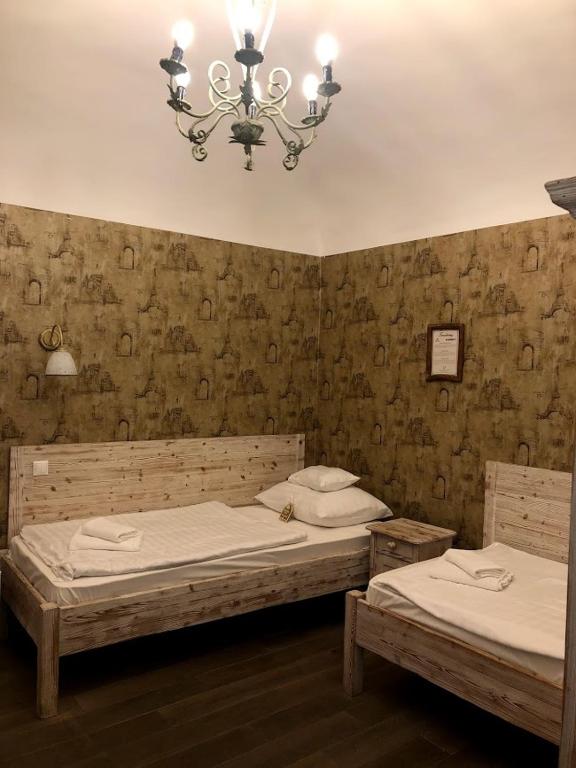 Двухместный (Двухместный номер с 2 отдельными кроватями - Подходит для гостей с ограниченными физическими возможностями) отеля Boutique Hotel Régi Posta, Дебрецен