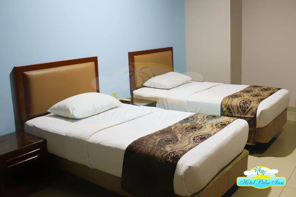 Двухместный (Двухместный номер с 2 отдельными кроватями) отеля Hotel Palm Inn Butterworth, Пенанг