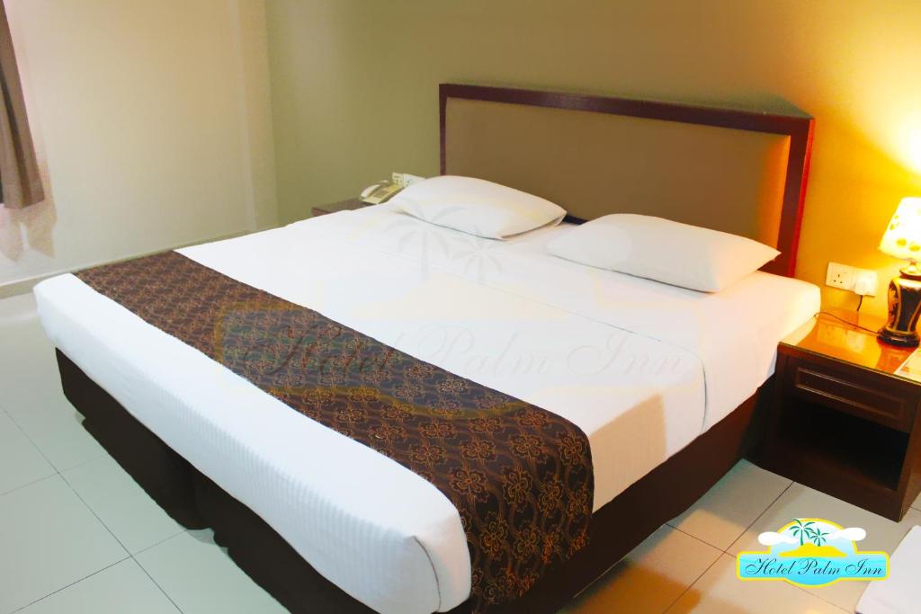 Двухместный (Двухместный номер Делюкс с 1 кроватью) отеля Hotel Palm Inn Butterworth, Пенанг