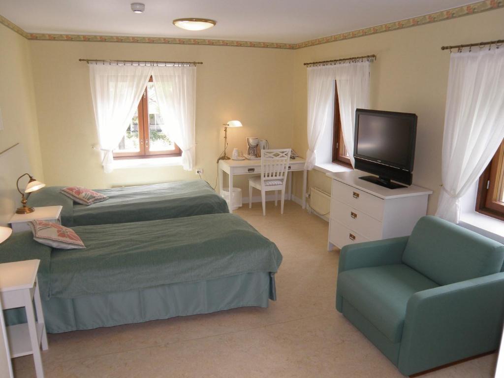 Двухместный (Стандартный двухместный номер с 2 отдельными кроватями) отеля Kyyhkylä Hotel and Manor, Миккели