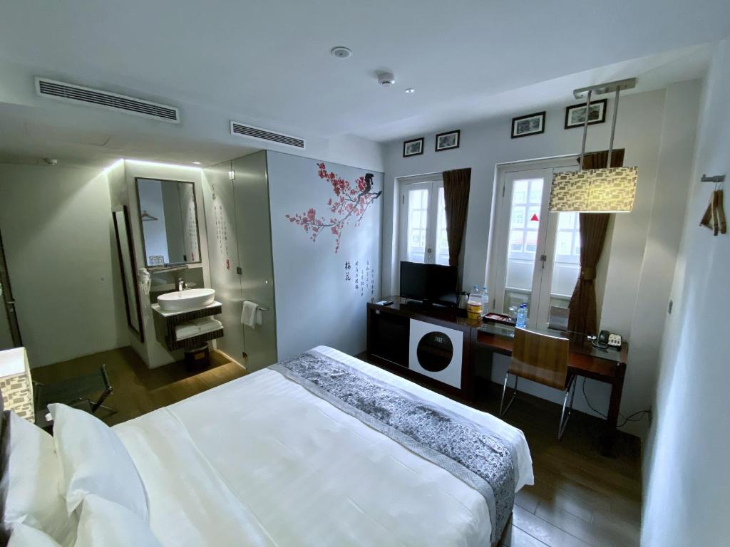 Двухместный (Номер Делюкс с кроватью размера «king-size») отеля Bliss Hotel Singapore, Сингапур (город)