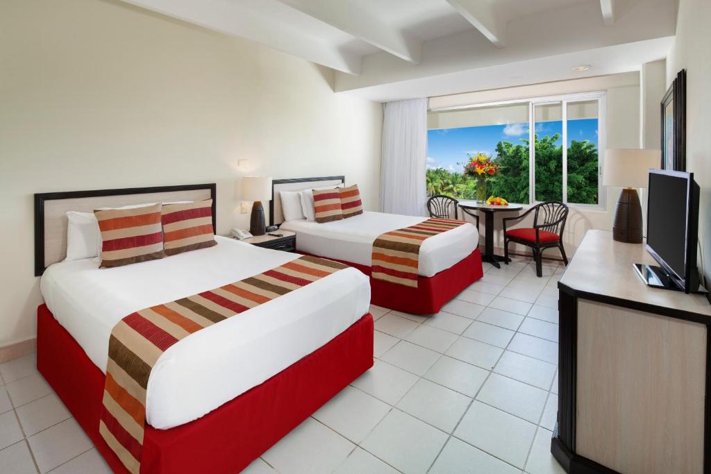 Двухместный (Стандартный номер (оплата не возвращается)) курортного отеля Oasis Palm - Все включено, Канкун