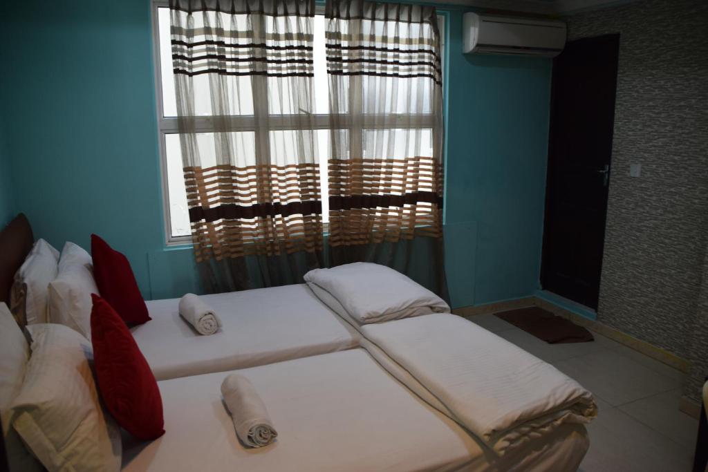 Двухместный (Двухместный номер Делюкс с 2 отдельными кроватями) гостевого дома RANI BEACH MALDIVES, Хулхумале