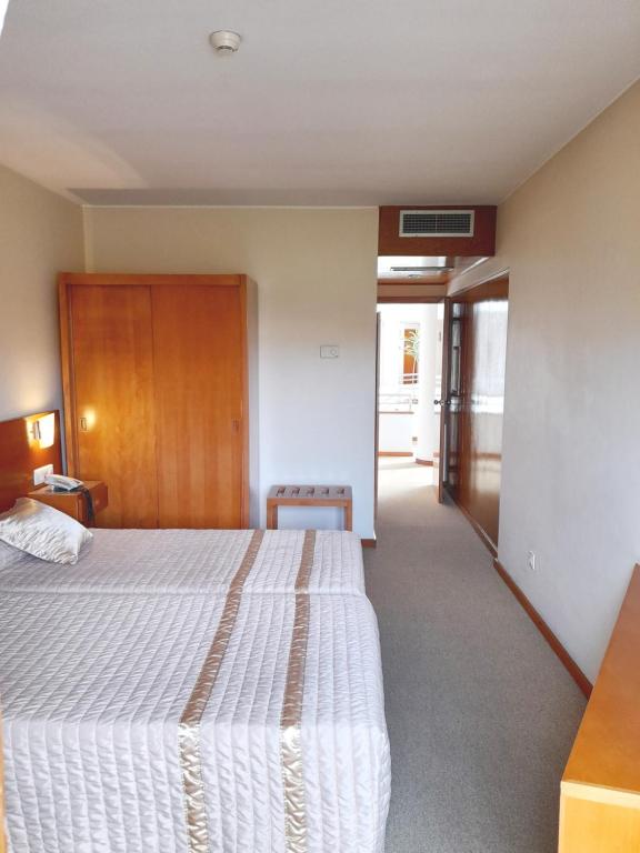 Двухместный (Двухместный номер с 2 отдельными кроватями) отеля Hotel das Taipas, Гимарайнш