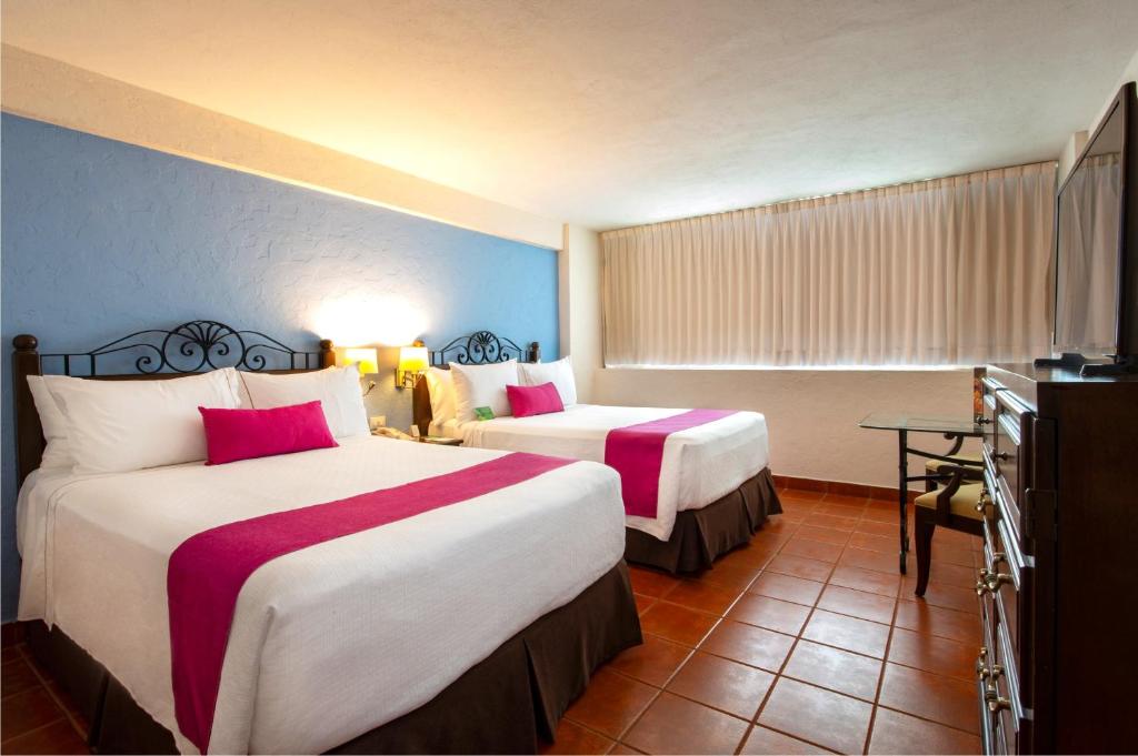 Двухместный (Улучшенный двухместный номер с 1 кроватью) отеля Gamma de Fiesta Inn Merida El Castellano, Мерида