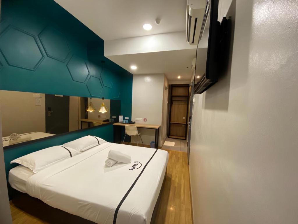 Двухместный (Двухместный номер Делюкс с 1 кроватью) отеля Smile Hotel Selayang Point, Куала-Лумпур