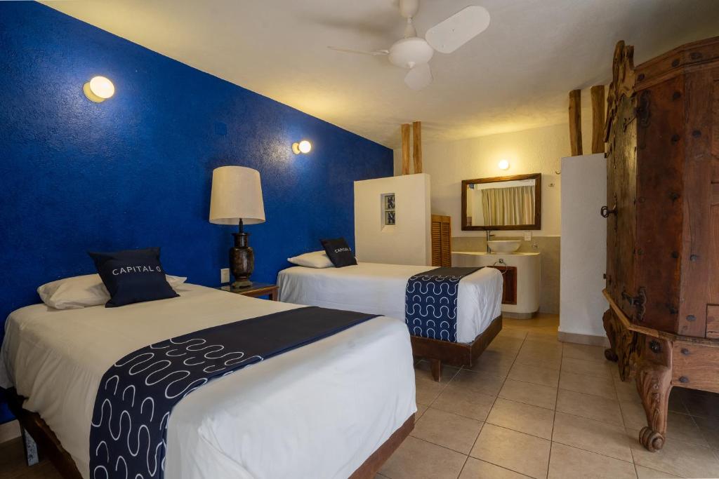 Двухместный (Двухместный номер Делюкс с 2 отдельными кроватями) отеля Hotel Mision y SPA Acapulco, Акапулько-де-Хуарес