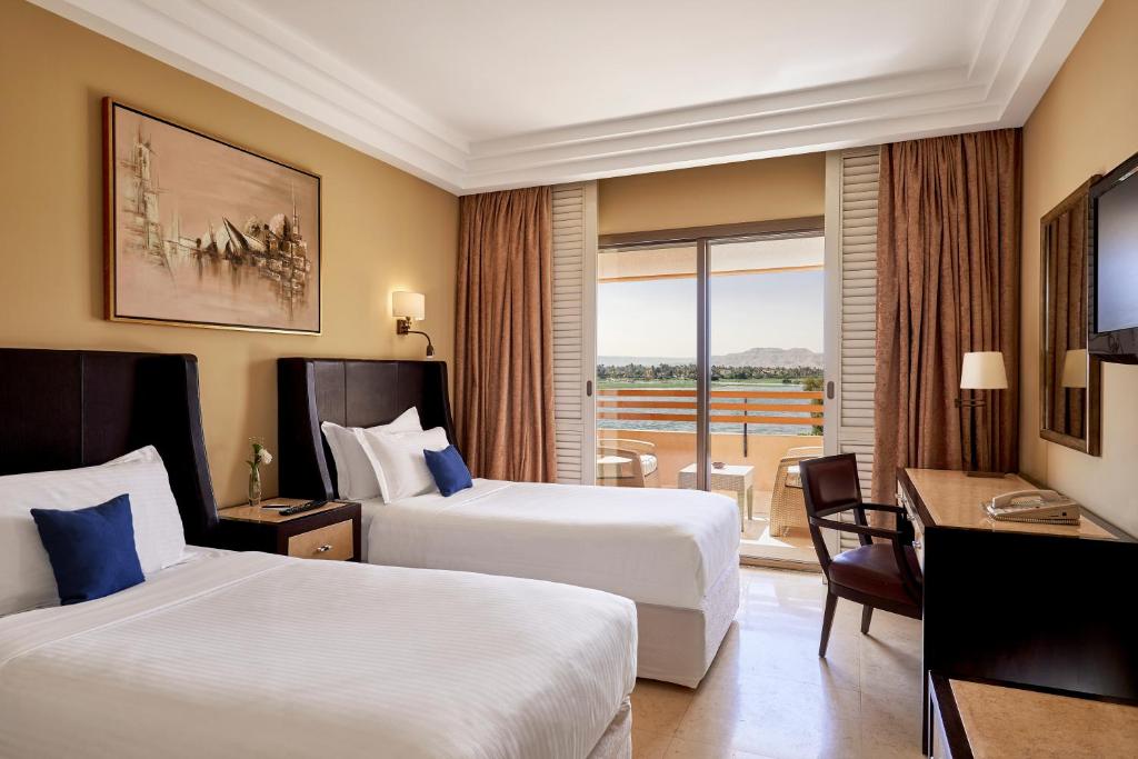 Двухместный (Улучшенный двухместный номер с 2 отдельными кроватями и видом на Нил) отеля Achti Resort, Луксор