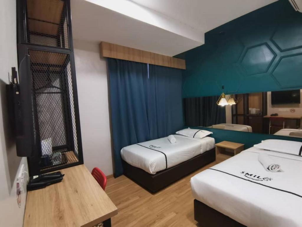 Двухместный (Двухместный номер с 2 отдельными кроватями) отеля Smile Hotel Selayang Point, Куала-Лумпур