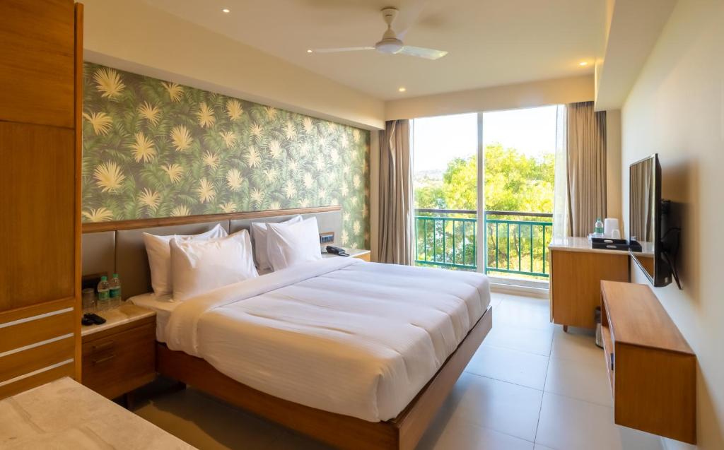 Двухместный (Номер Делюкс) курортного отеля Regenta Place Mandrem Beach Resort, Мандрем