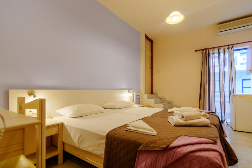Двухместный (Двухместный номер с 2 отдельными кроватями и боковым видом на море) гостевого дома Scorpios, Палеохара