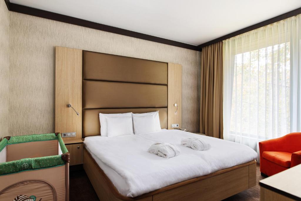 Двухместный (Двухместный номер Делюкс с 1 кроватью или 2 отдельными кроватями) отеля Portobello Wellness & Yacht Hotel, Эстергом
