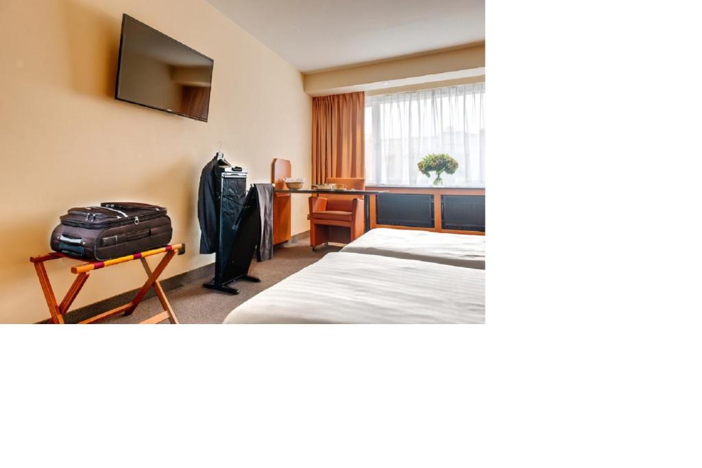 Двухместный (Стандартный двухместный номер с 1 кроватью или 2 отдельными кроватями) апарт-отеля Arass Business Flats, Антверпен