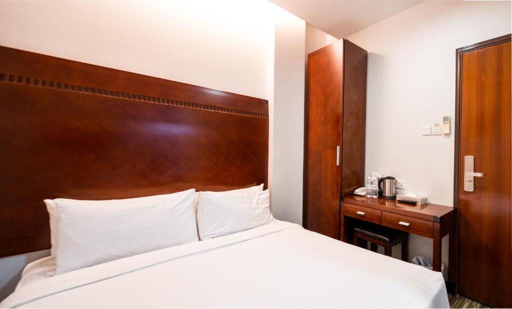 Двухместный (Улучшенный двухместный номер с 1 кроватью (без окон)) отеля Santa Grand Hotel West Coast, Сингапур (город)