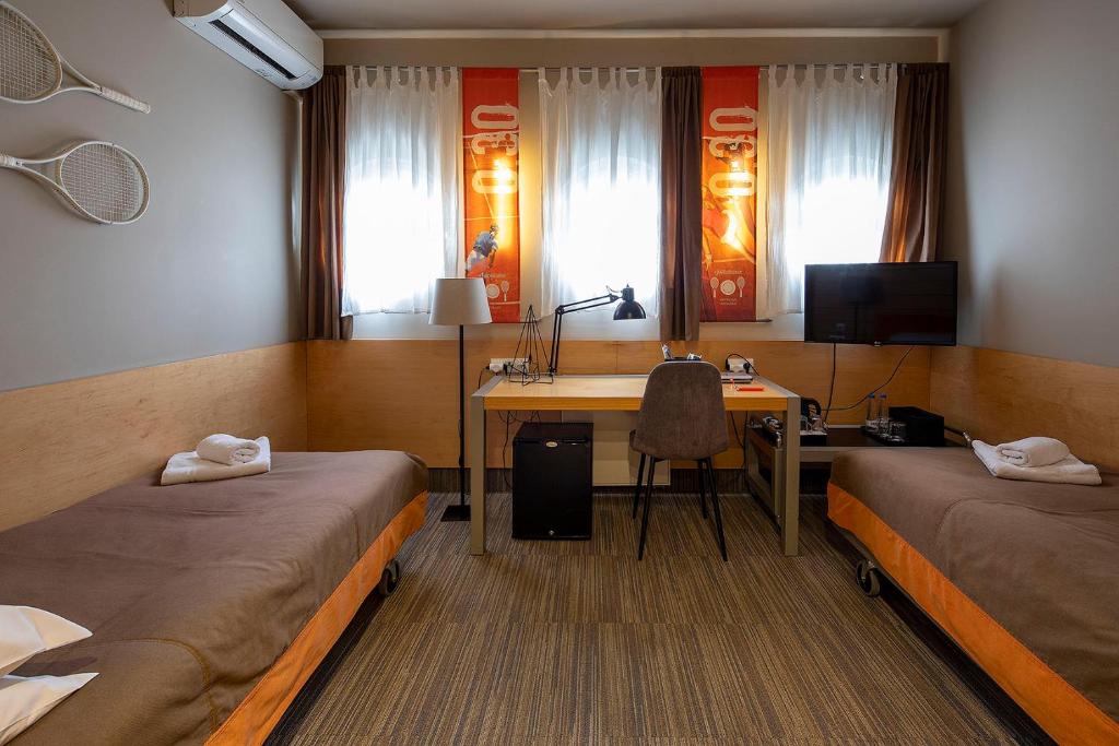 Двухместный (Двухместный номер с 2 отдельными кроватями) отеля Hotel Kortowo, Познань