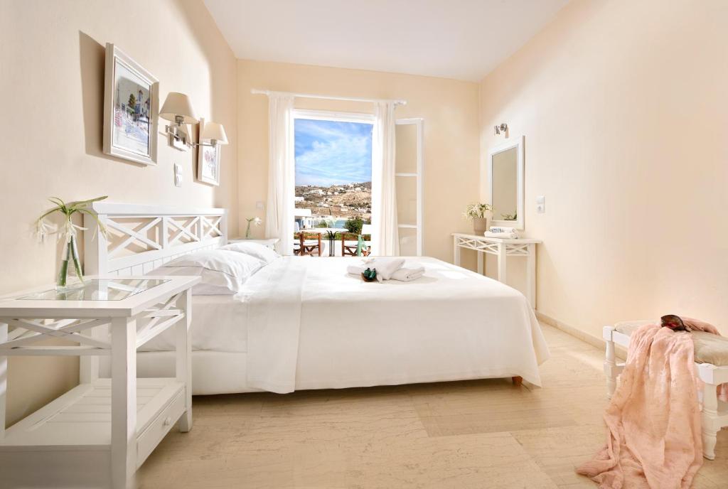 Двухместный (Элегантный двухместный номер с 1 кроватью или 2 отдельными кроватями, вид на море) отеля Erato Hotel Mykonos, Орнос