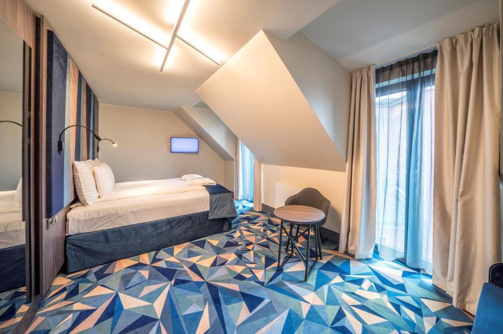 Двухместный (Улучшенный двухместный номер с 1 кроватью или 2 отдельными кроватями) отеля Wellton Riverside SPA Hotel, Рига