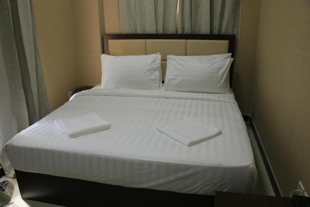 Двухместный (Стандартный двухместный номер с 1 кроватью) отеля OYO 102 Alpha Suites, Салала
