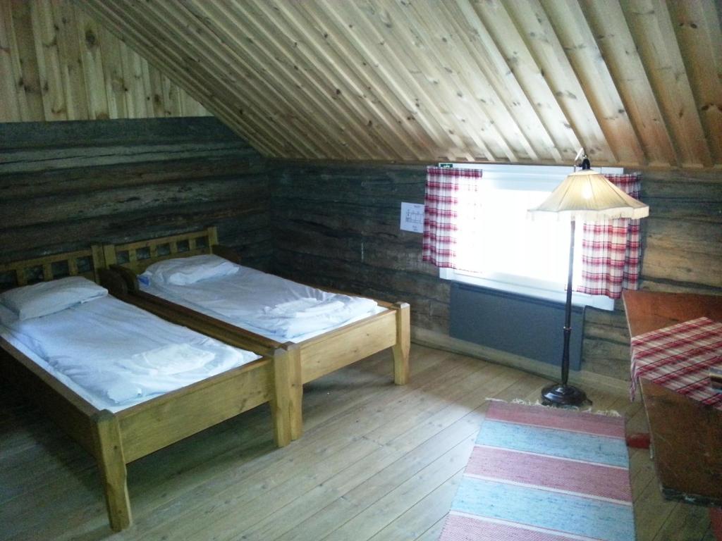 Двухместный (Двухместный номер с 2 отдельными кроватями и общей ванной комнатой) семейного отеля Kolin Ryynänen, Колинкюла
