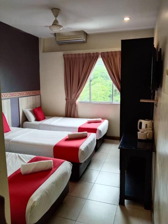 Сьюит (Улучшенный люкс) отеля OYO 497 ESQ Ferringhi Hotel, Пенанг
