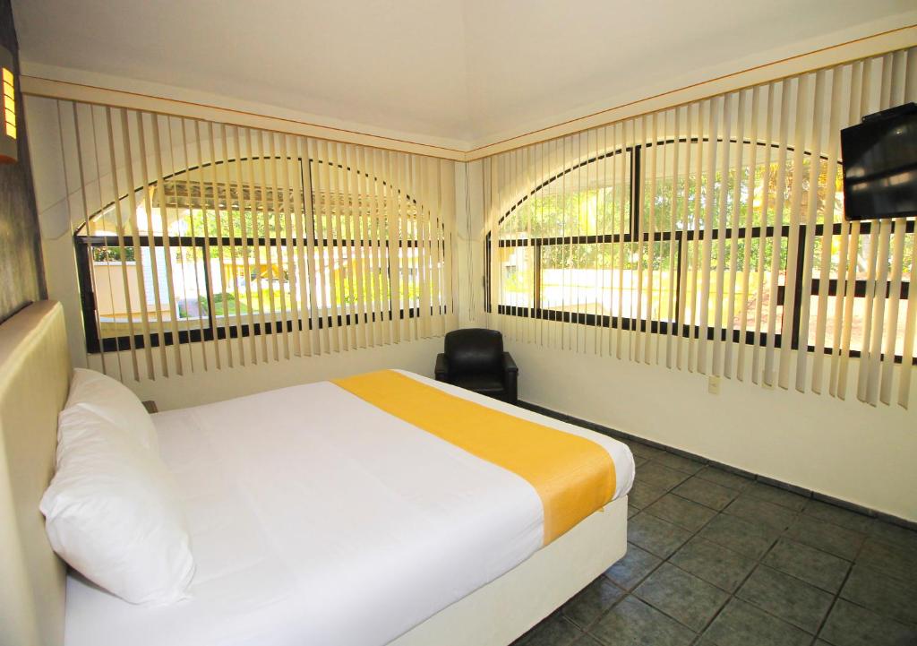 Двухместный (Номер Делюкс с кроватью размера «king-size») отеля Hotel Gran Palmeiras, Чачалакас