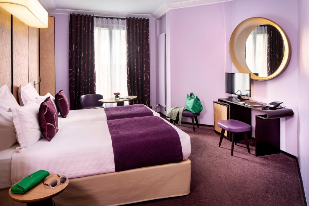 Двухместный (Улучшенный двухместный номер с 1 кроватью или 2 отдельными кроватями) отеля Hotel Maison FL, Париж