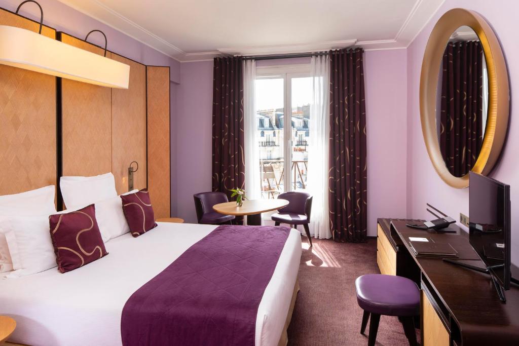 Двухместный (Двухместный номер Делюкс с 1 кроватью или 2 отдельными кроватями) отеля Hotel Maison FL, Париж