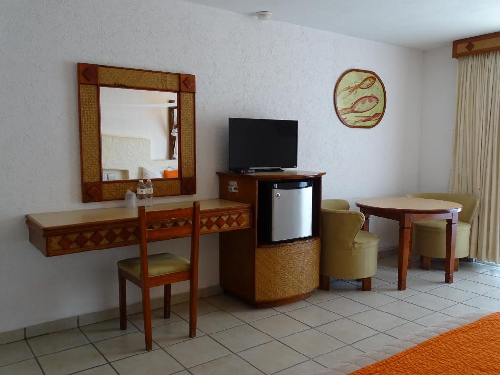 Двухместный (Двухместный номер с 1 кроватью или 2 отдельными кроватями) отеля Hotel Palapa Palace, Тустла-Гутьеррес
