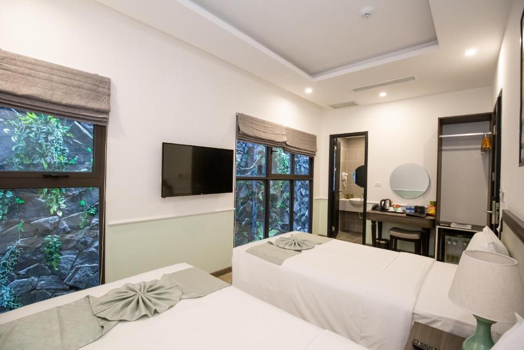 Двухместный (Улучшенный двухместный номер с 2 отдельными кроватями) отеля Paralia Khem Beach Phu Quoc Hotel, Дуонг-Донг