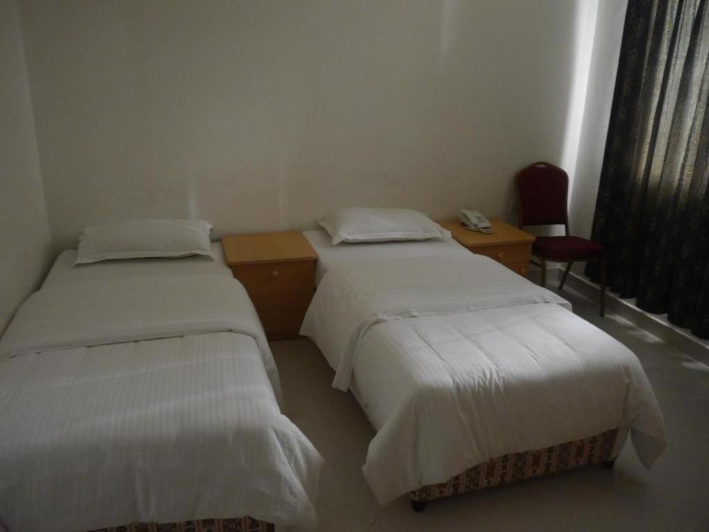 Двухместный (Двухместный номер Делюкс с 2 отдельными кроватями) отеля Plaza Hotel, Маскат