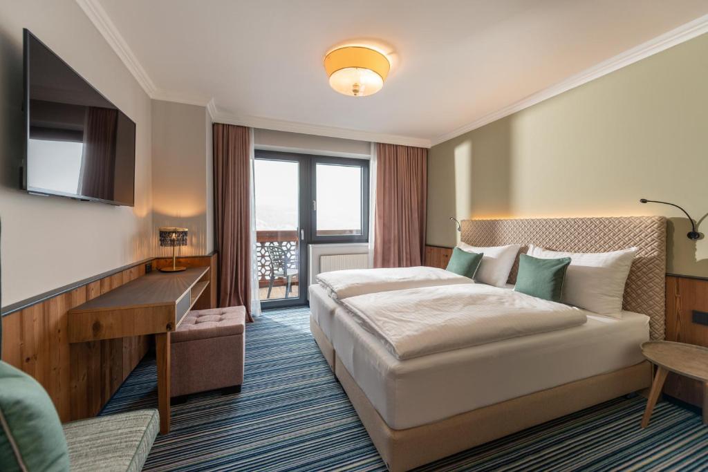 Двухместный (Улучшенный двухместный номер с 1 кроватью) отеля Alpenhotel Erzherzog Johann, Шладминг