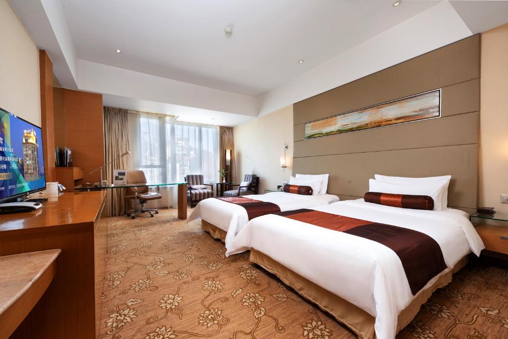 Двухместный (Двухместный номер Делюкс с 2 отдельными кроватями) отеля Jinling Hotel Wuxi, Уси