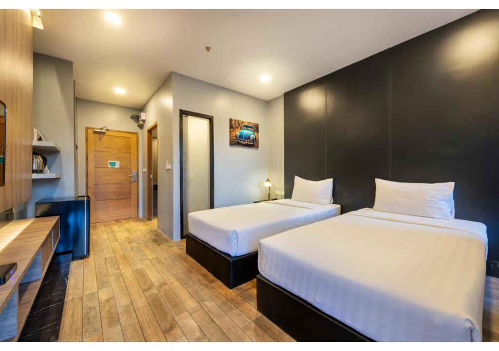 Двухместный (Двухместный номер с 1 кроватью или 2 отдельными кроватями и базовыми удобствами) отеля The Wind, Чонбури