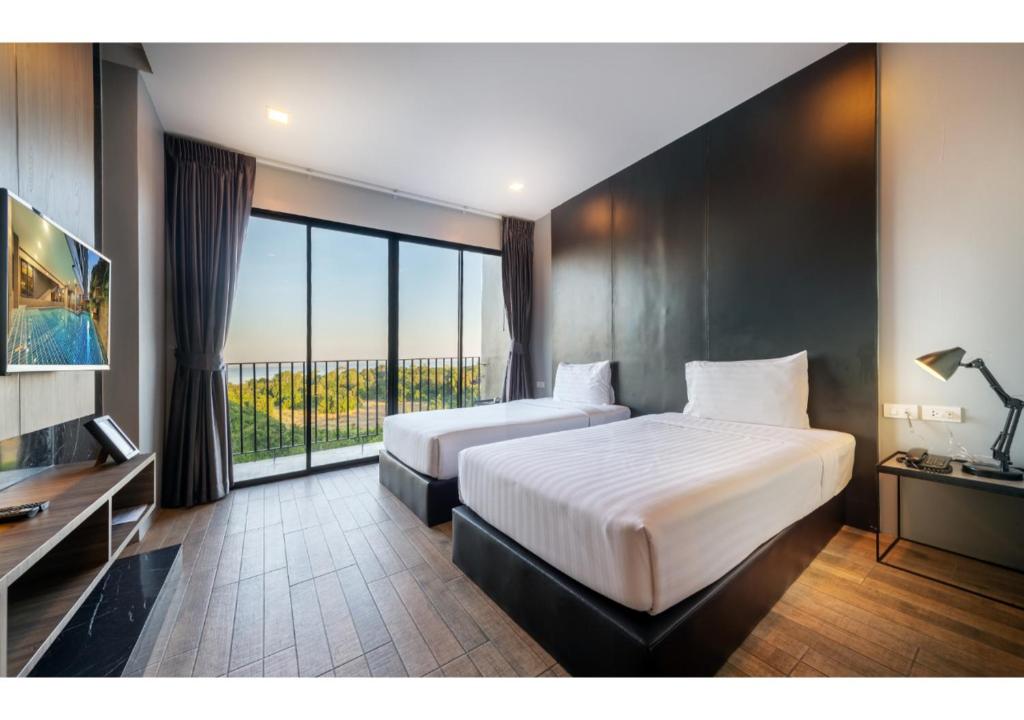 Двухместный (Стандартный двухместный номер с 1 кроватью или 2 отдельными кроватями и видом на море) отеля The Wind, Чонбури