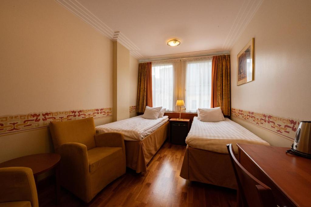 Двухместный (Двухместный номер бизнес-класса с 2 отдельными кроватями) отеля Hotel Arthur, Хельсинки